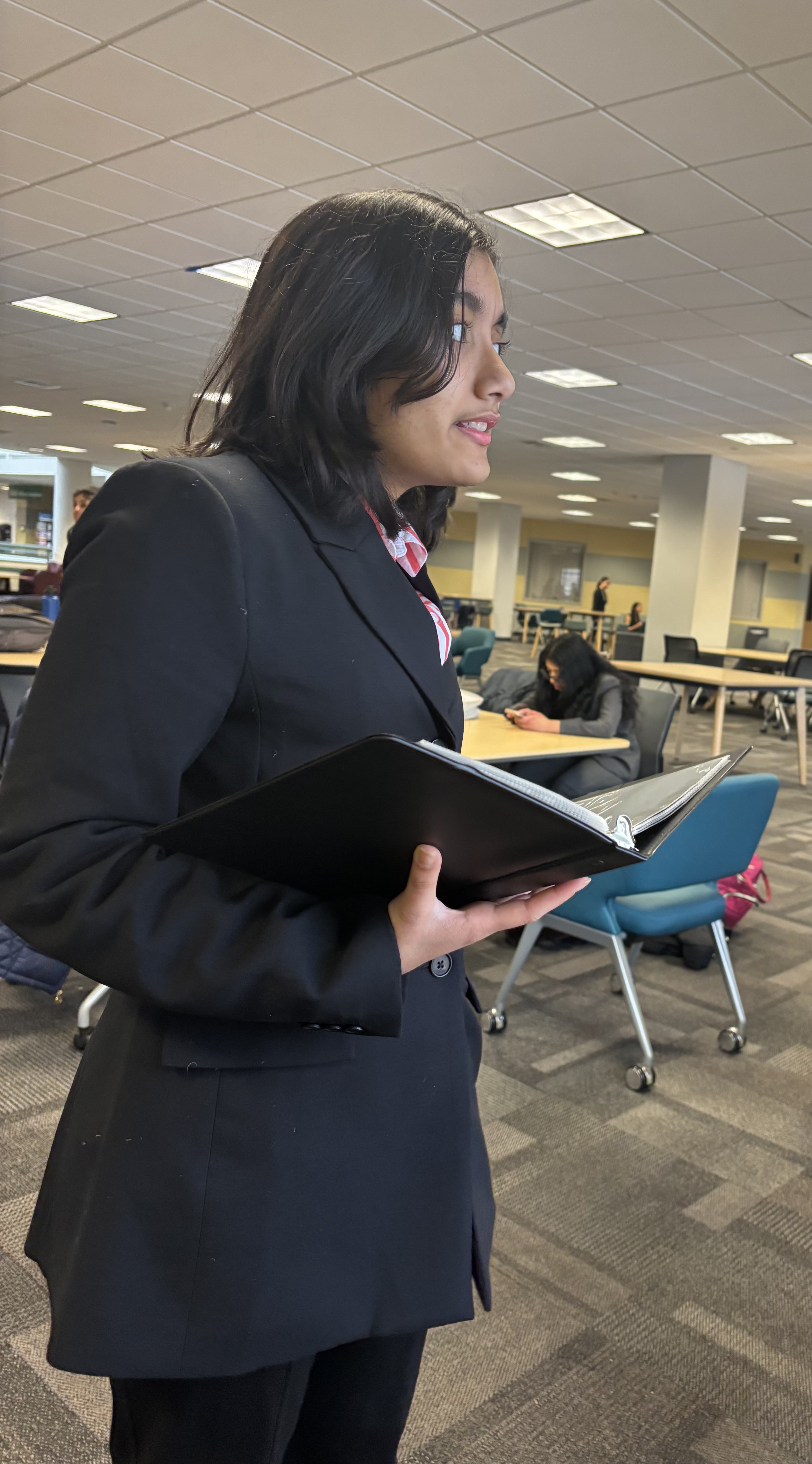 A photo of me with my binder